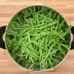 a colander of blanched green beans