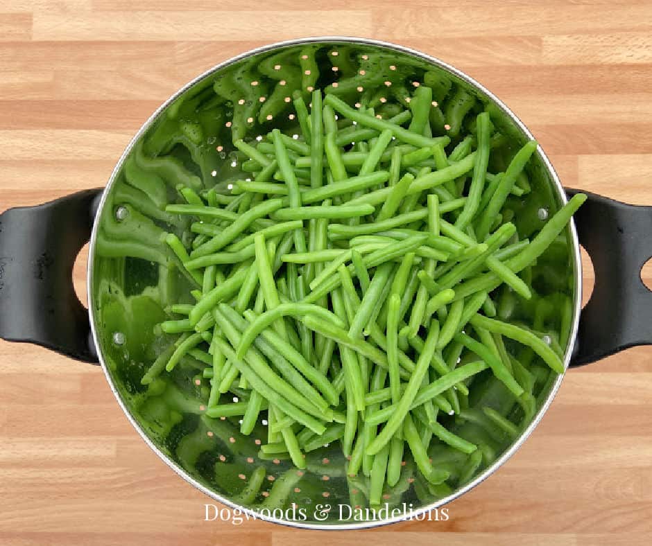 a colander of blanched green beans