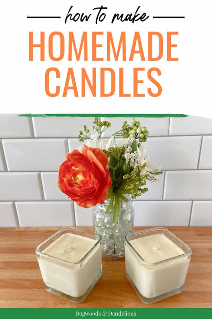 2 homemade candles in front of a vase of flowers