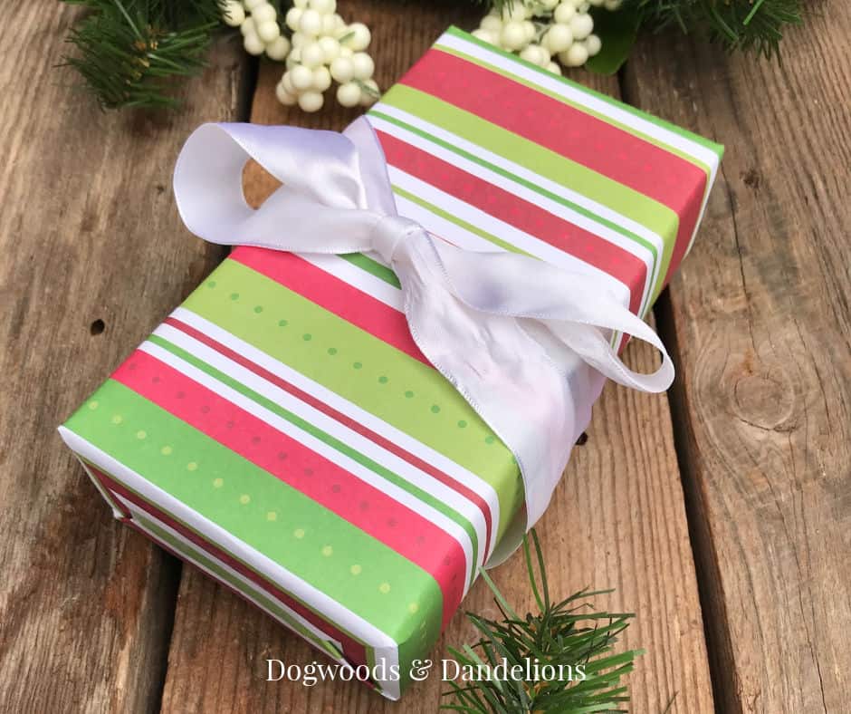 a Christmas gift wrapped and tied with a bow