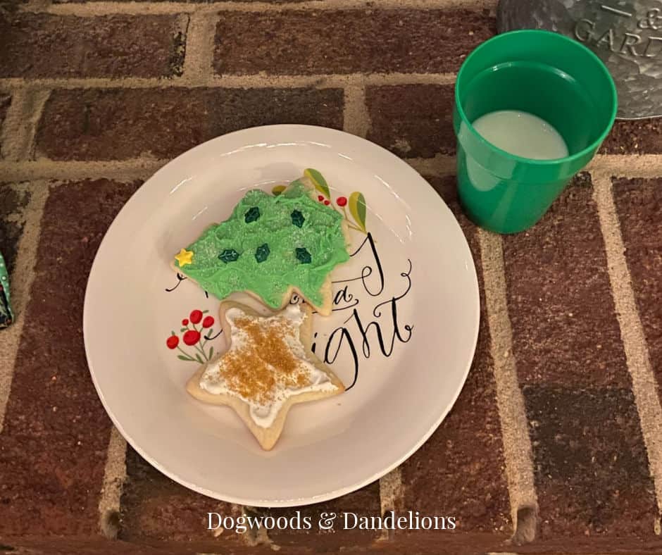 decorated sugar cookies and milk sat out for Santa