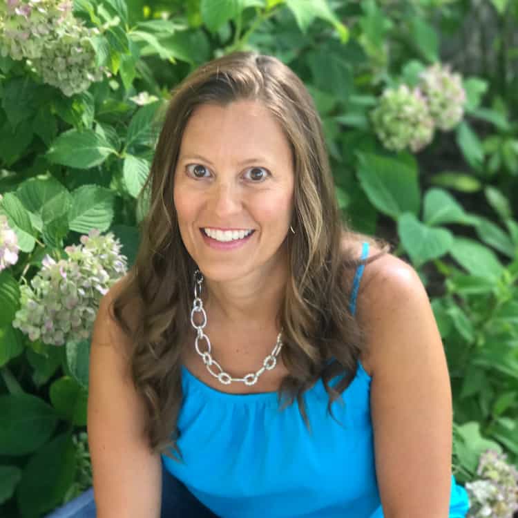 picture of julie b in front of hydrangea