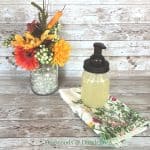 natural foaming hand soap with flowers and towel