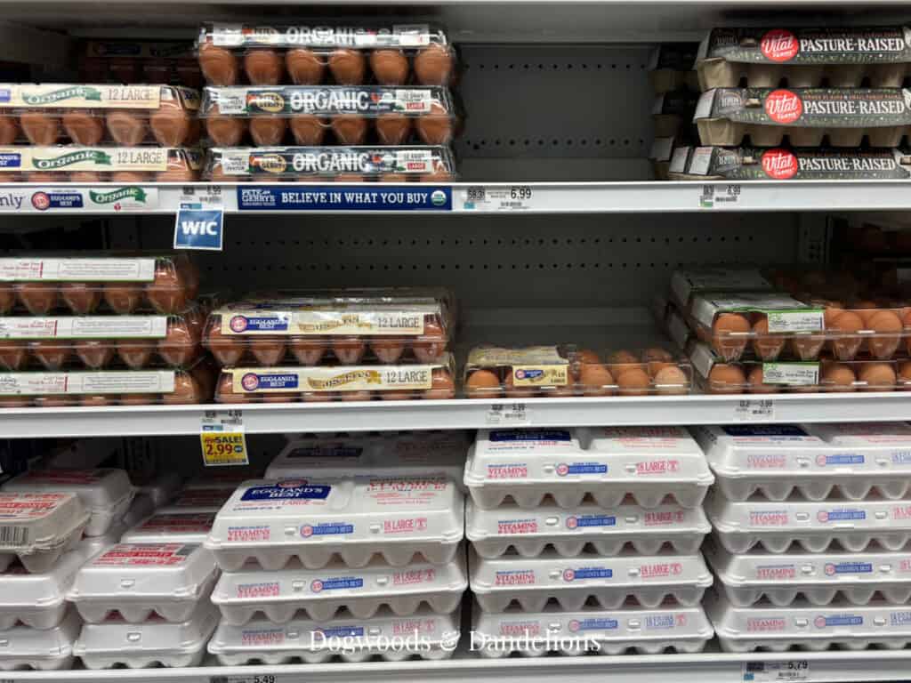 egg cartons on the shelf of a grocery store