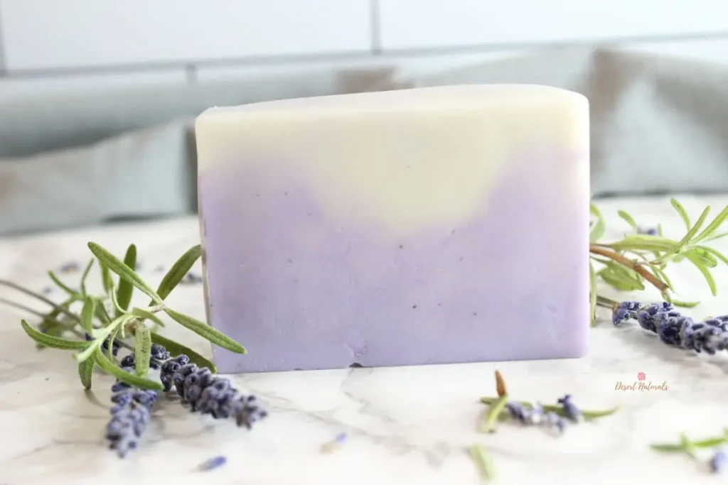 rosemary lavender soap surrounded by lavender flowers